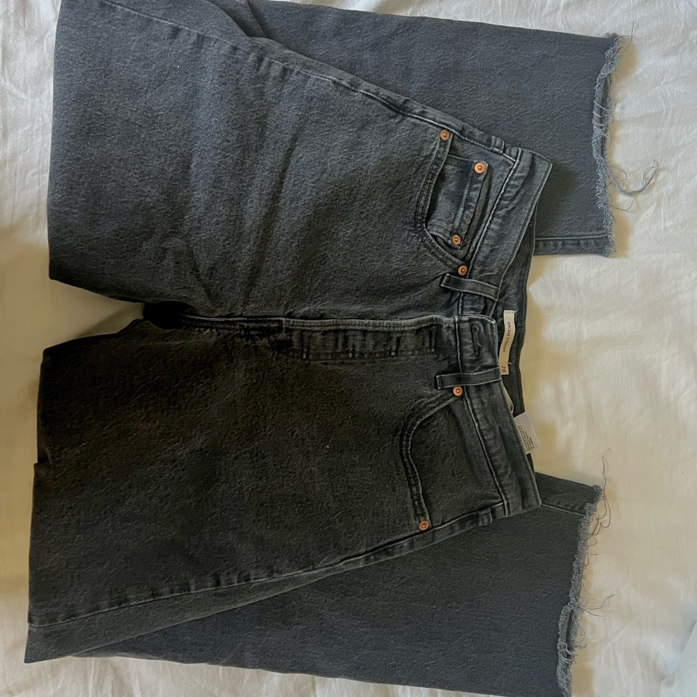 Levi Black rib cage straight jeans with ripped knee holes size 28